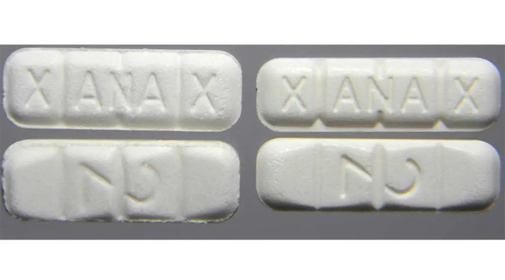 comparing fake Xanax pills to real or authentic xanax pills