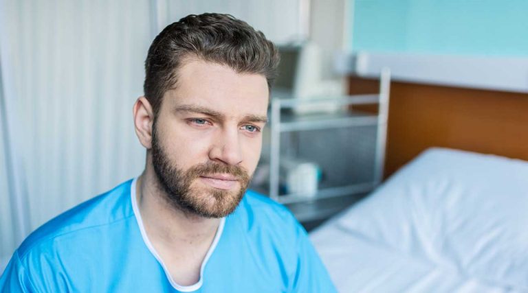 man in hospital experiencing methadone withdrawal and detox