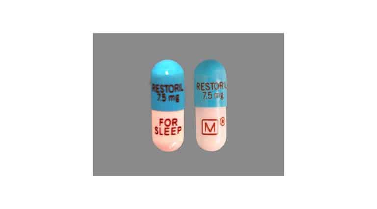 image of two restoril temazepam pills blue and white side effects of restoril