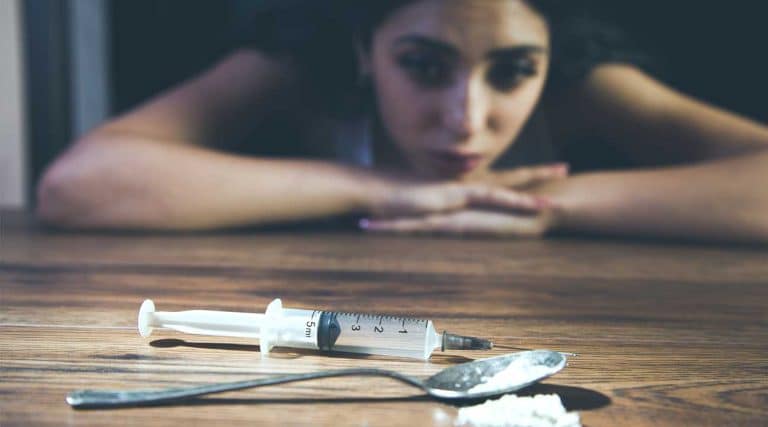 young woman signs of a heroin relapse rates