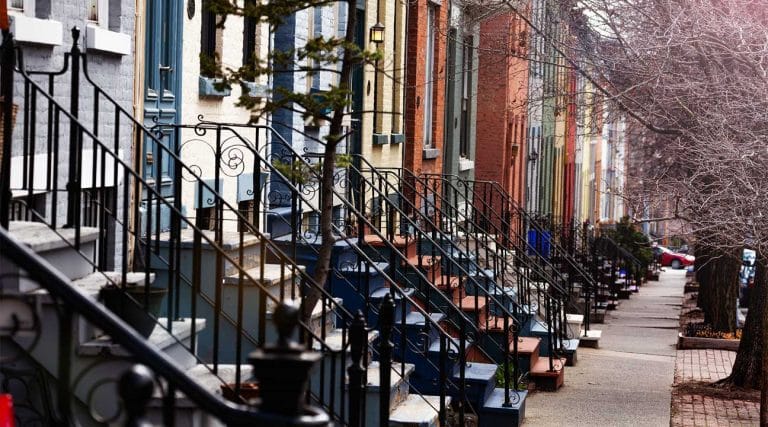stoops steps along a busy street in Lancaster, New York