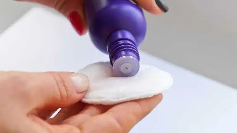 purple bottle of nail polish remover - Acetone Poisoning & The Dangers Of Drinking Nail Polish Remover