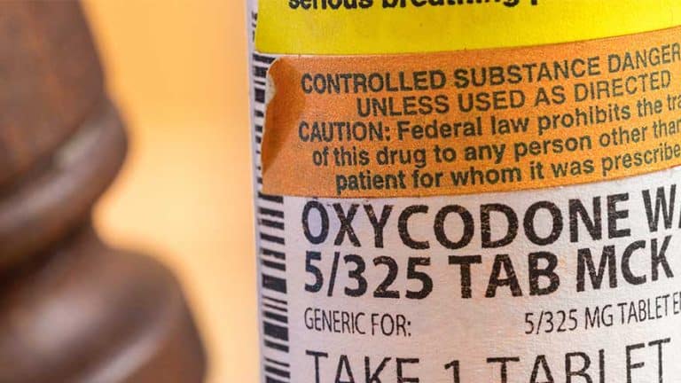 bottle of oxycodone pills - Oxycodone Schedule & Drug Class | What Schedule Is Oxycodone?