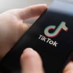 Tik Tok App On A Phone - NyQuil Chicken | Effects & Dangers Of TikTok Trend