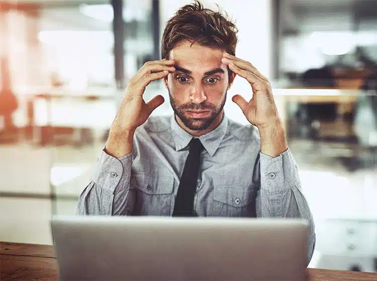 Man With Anxiety At Work-8 Signs Of High-Functioning Anxiety